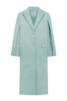 Light blue Sayya coat cape displayed on a hanger, showcasing its elegant fabric and stylish design for women.