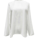 Arti Apparel CORA TOP, stylish women's sleeveless top in soft fabric, shown in natural beige with a relaxed fit.