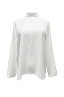 Arti Apparel CORA TOP, stylish women's sleeveless top in soft fabric, shown in natural beige with a relaxed fit.