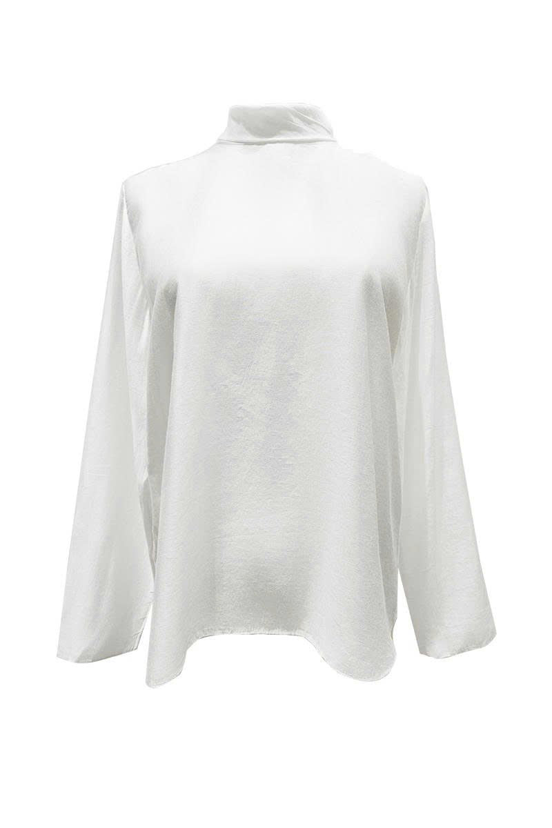 Arti Apparel CORA TOP, stylish women's sleeveless top in soft fabric, shown in natural beige with a relaxed fit.