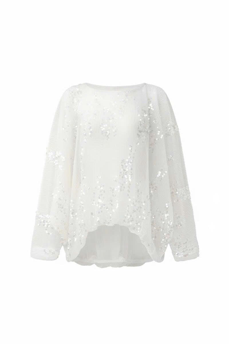 Arti Apparel Grace Top, stylish women's blouse with elegant design, displayed on a hanger.