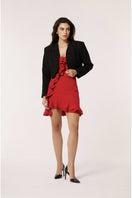 Red Señorita Penelope mini dress shown on a model, featuring a stylish and fitted design perfect for fashionable occasions.