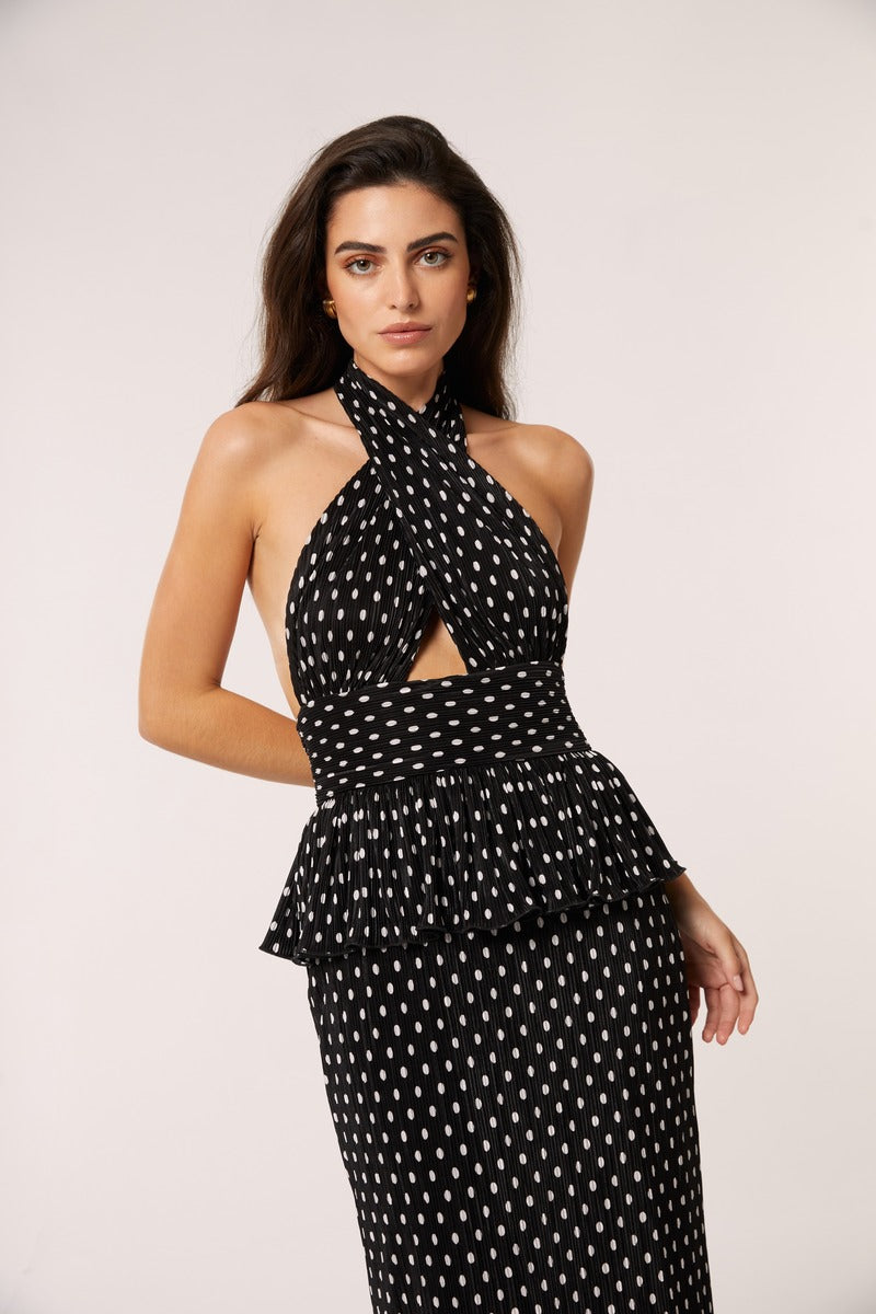 Black Señorita Sofia maxi dress displayed on a hanger, showcasing its flowing fabric and elegant design.
