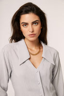 Gray Alba blouse by Señorita, stylish shirt with a relaxed fit, displayed on a hanger against a neutral background.