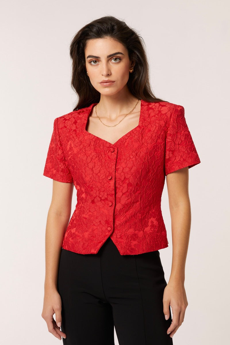 Señorita Aurora top in vibrant red, stylish women's blouse with a flattering fit, shown on a mannequin.