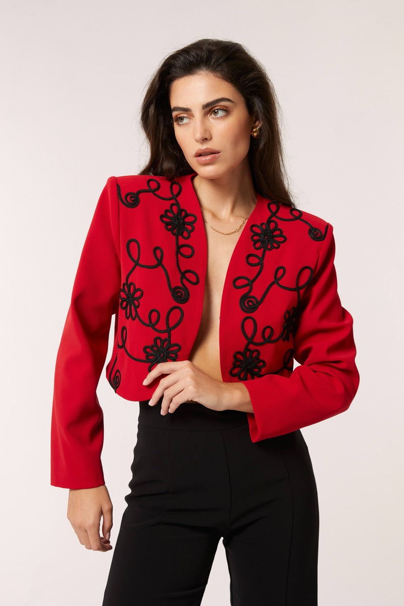 Señorita Rosalia red jacket with stylish design, featuring a fitted silhouette and modern details, perfect for casual wear.