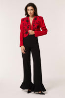 Red Señorita Rosalia jacket with stylish design, featuring a tailored fit and vibrant color, perfect for casual or dressy occasions.