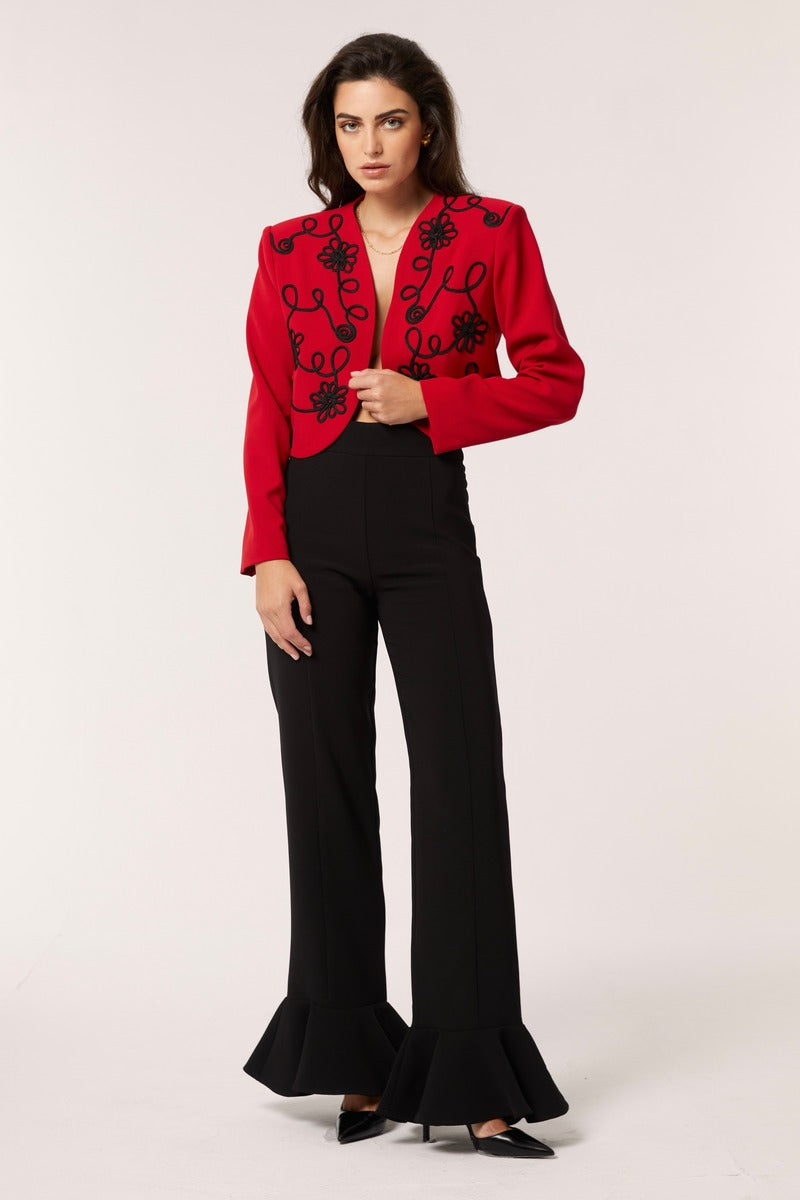 Red Señorita Rosalia jacket with stylish design, featuring a tailored fit and vibrant color, perfect for casual or dressy occasions.