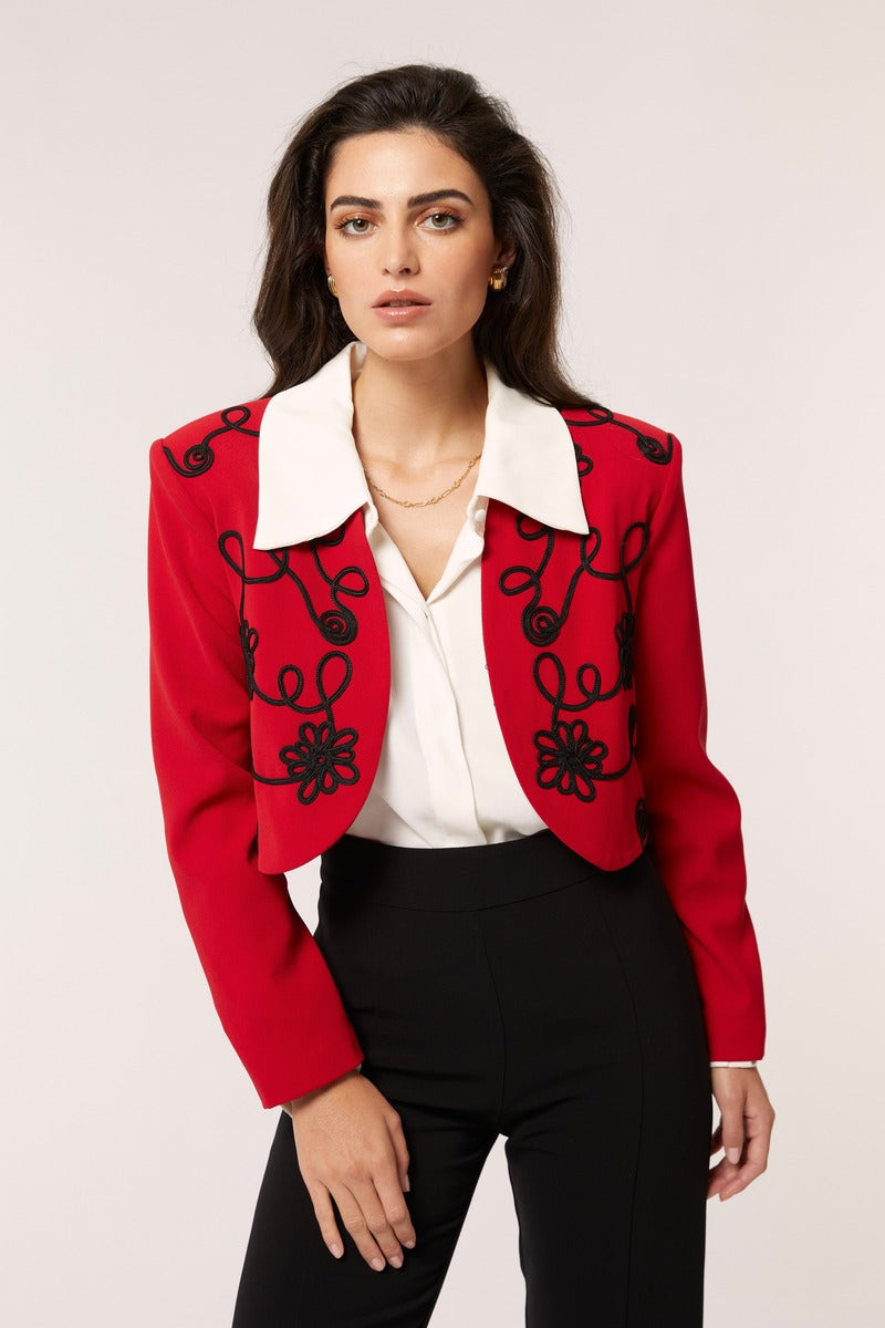 Señorita Rosalia red jacket with stylish design, front zipper, and collar, displayed on a hanger.