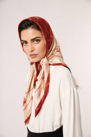 Red Señorita Luisa scarf displayed flat, showcasing soft fabric and stylish design perfect for scarves and shawls.