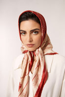 Red Señorita Luisa scarf featuring soft fabric and elegant drape, perfect for accessorizing outfits.