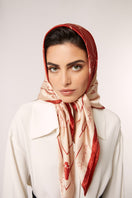 Señorita Luisa red scarf draped over a neutral background, showcasing soft fabric and elegant style for scarves and shawls.
