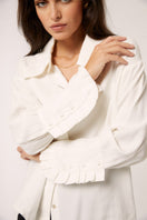 Señorita Antonia white blouse featuring a classic design, long sleeves, and a relaxed fit, suitable for casual or office wear.