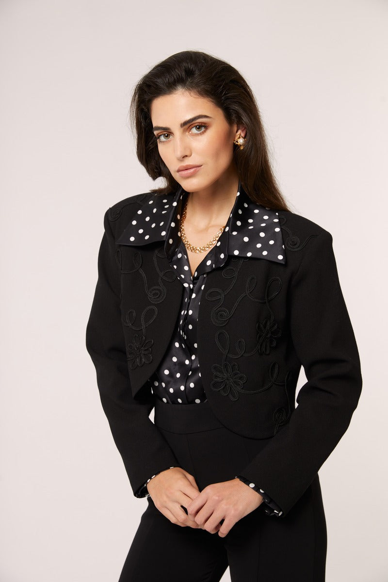 Black and white polka dot blouse by Señorita, Antonia Polka Blouse, featuring a classic shirt design with a stylish pattern.