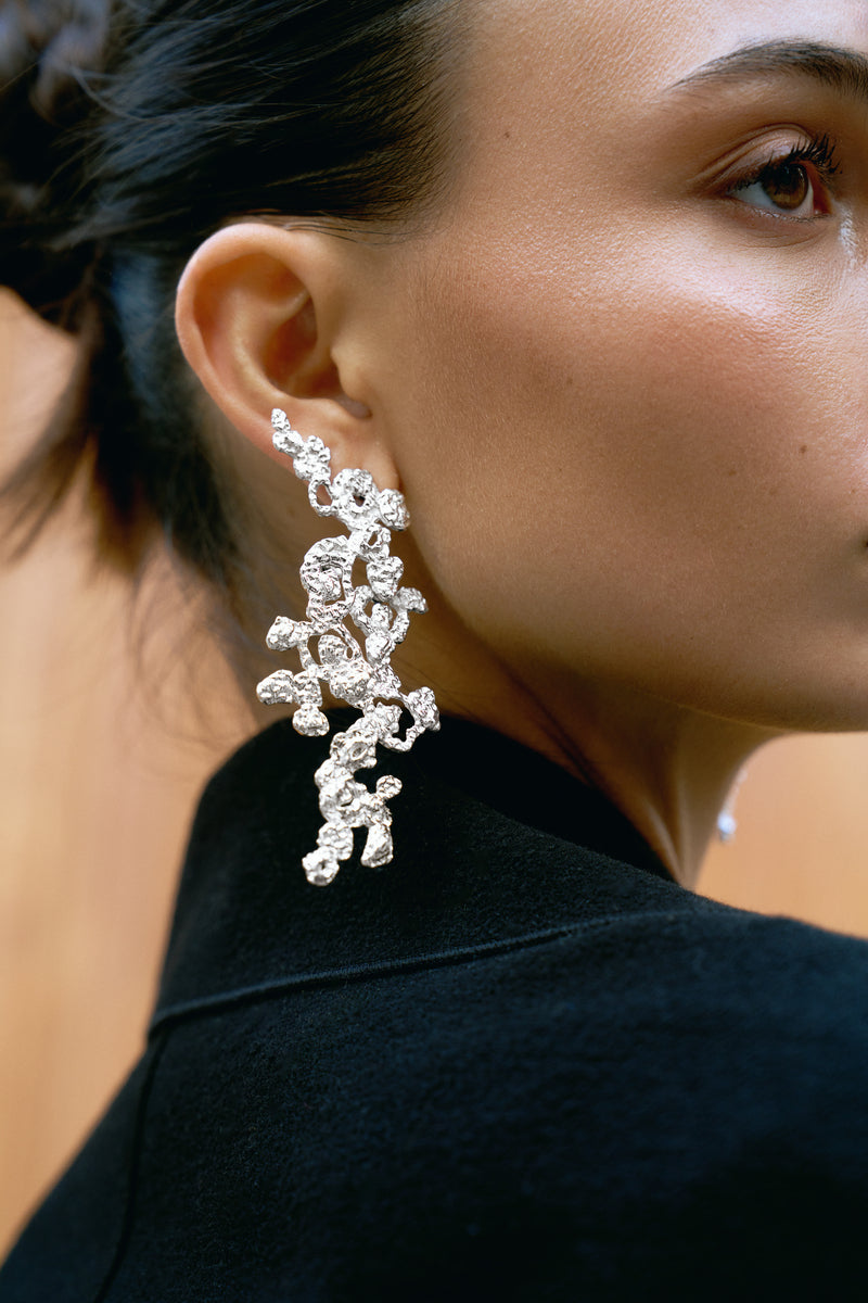 Silver Riverstone earrings by Jude Benhalim featuring elegant, polished stones set in stylish silver earrings.