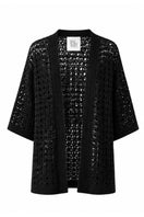 Black YOKO Resort Jacket by First Born Knits, stylish lightweight jacket with a relaxed fit and subtle branding.