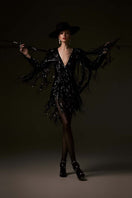Alersundi Donna jumpsuit in stylish fabric, featuring a fitted waist and wide-leg design, shown on a model.