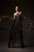 Elegant Marilyn gown by Alersundi featuring intricate lace details and flowing fabric, perfect for formal occasions.