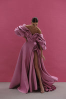 Pink volume sculpted gown by Monetre featuring elegant fabric and a fitted silhouette, perfect for formal occasions.