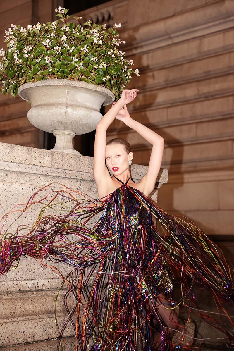 Alersundi Marilyn gown displayed on a mannequin, elegant long evening dress with intricate detailing and flowing fabric.
