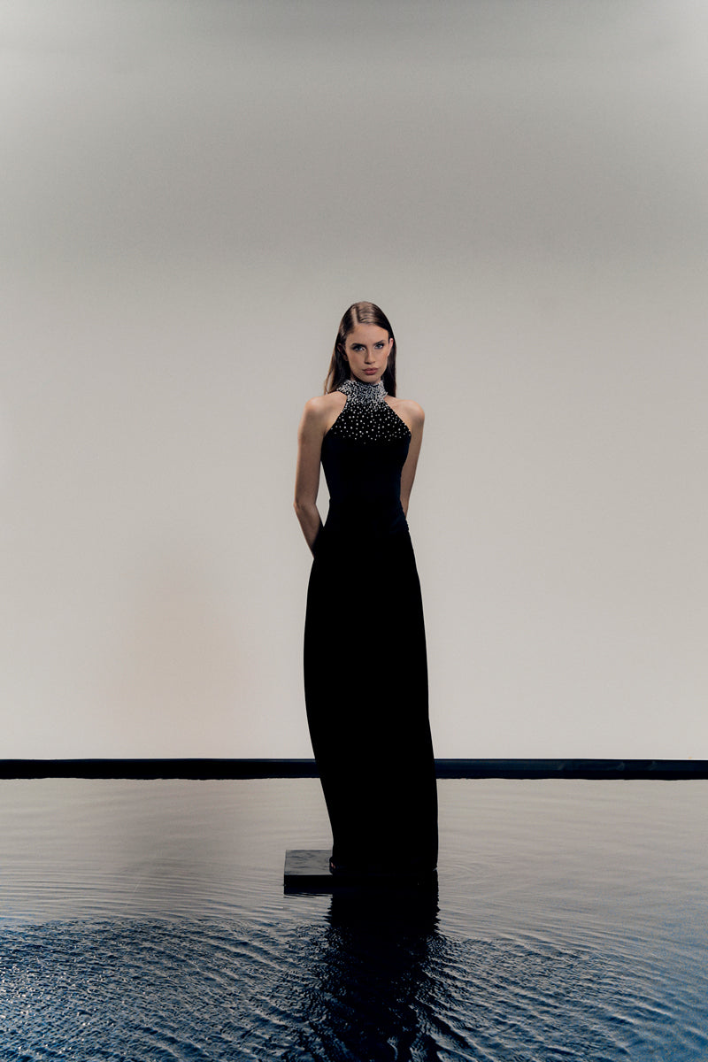 Francisco Arce ZENE midi dress, stylish and elegant, shown on a model with a flowing fabric and modern design.