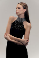 Francisco Arce ZENE midi dress featuring a stylish design and flowing fabric, perfect for elegant occasions.