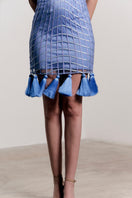 Francisco Arce SENA dress, a stylish mini dress with a fitted silhouette, displayed on a hanger against a neutral background.