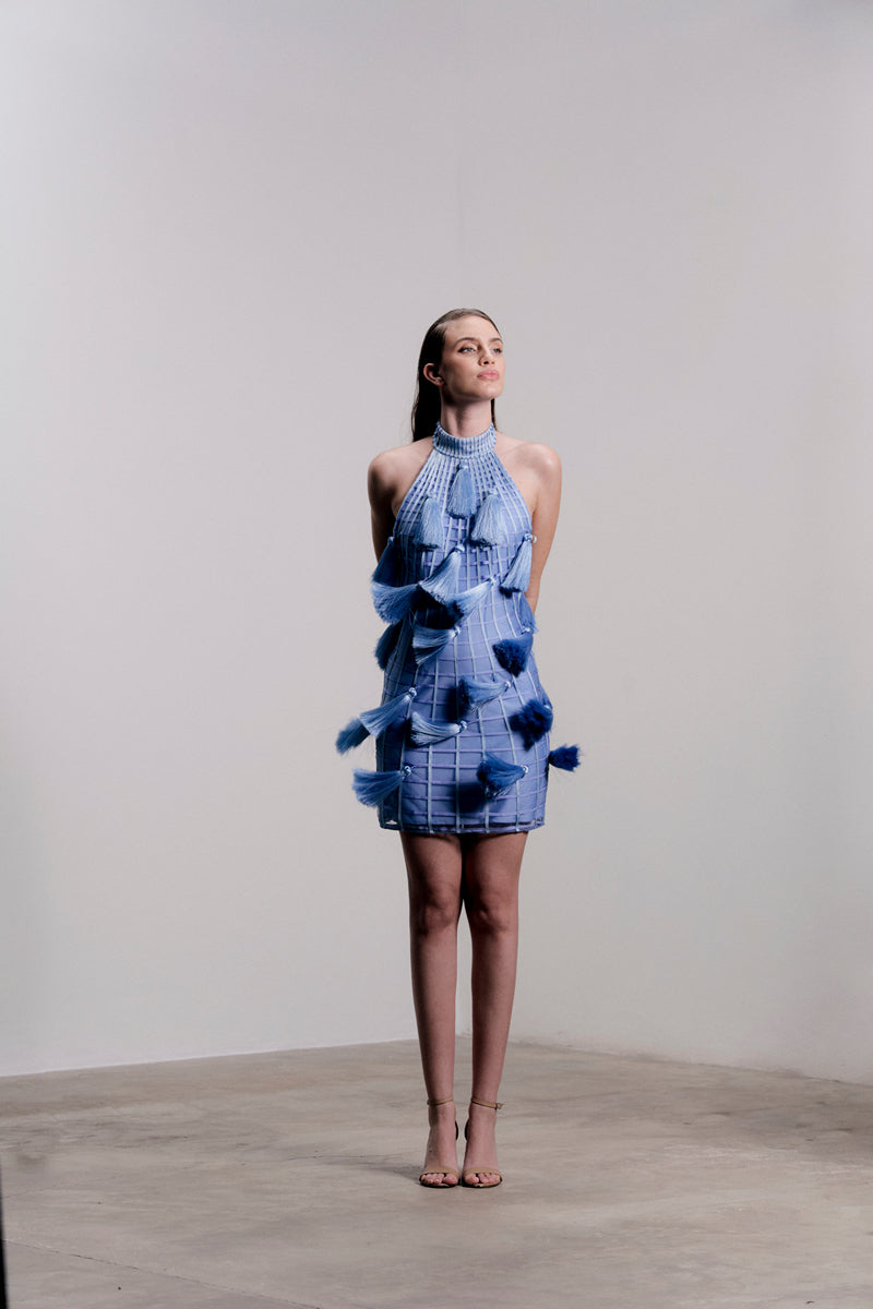 Francisco Arce KAY mini dress featuring a stylish design, showcased on a hanger against a neutral background.