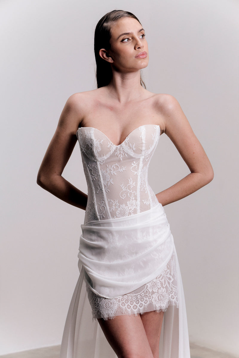 Francisco Arce LUMI mini dress with stylish design, featuring a fitted silhouette and trendy fabric in a vibrant color.