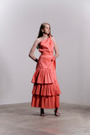 Long flowy Mila Maxi Skirt by Francisco Arce, featuring lightweight fabric and elegant design, shown in a stylish outdoor setting.