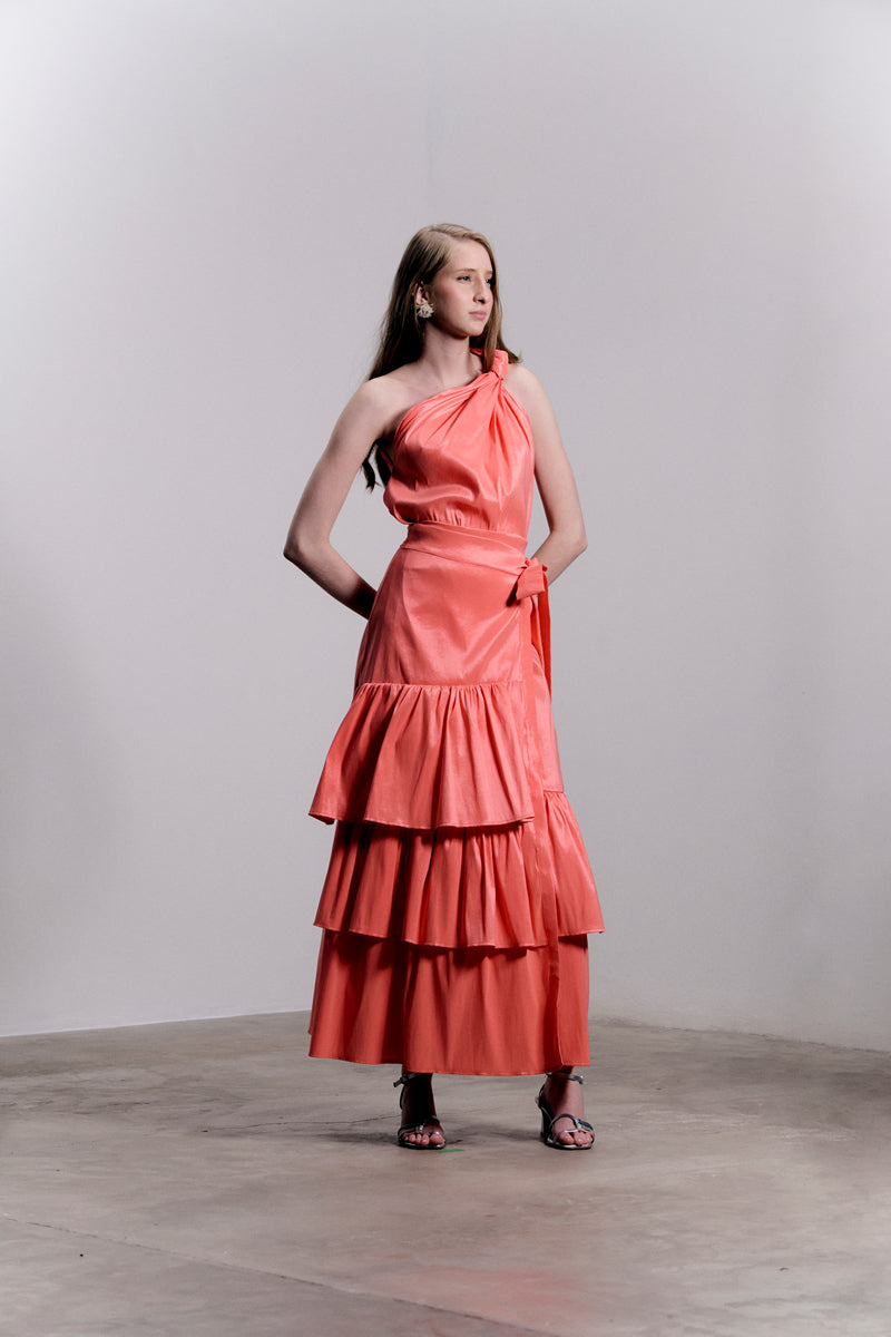 Long flowy Mila Maxi Skirt by Francisco Arce, featuring lightweight fabric and elegant design, shown in a stylish outdoor setting.