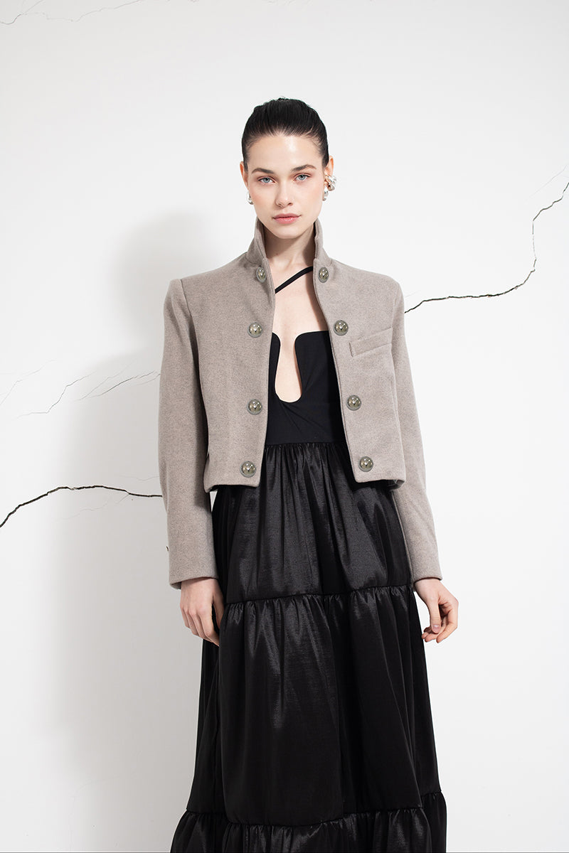 LEDIEL Nancy Jacket, stylish outerwear with a tailored fit, shown in a detailed close-up image highlighting fabric texture and design.
