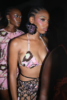 Pink Onalaja Zusi bikini top with adjustable straps and secure clasp, designed for stylish swimwear.