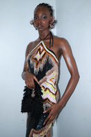 Elegant Zuri halter neck gown by Onalaja featuring flowing fabric and a sophisticated design, perfect for formal occasions.
