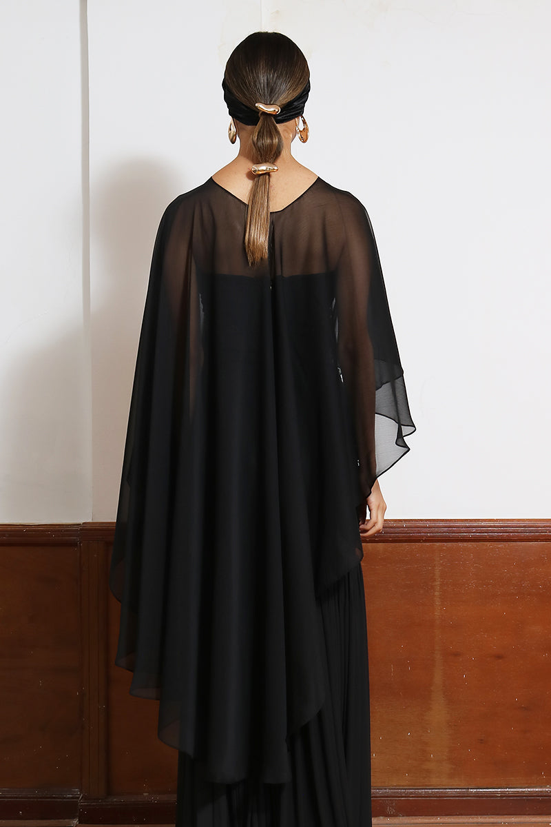LEDIEL MYNA Cape jacket displayed on a hanger, featuring a stylish, lightweight design with a hood and button details.
