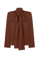Brown DELEGAN blouse with a stylish scarf accessory, featuring long sleeves and a relaxed fit.