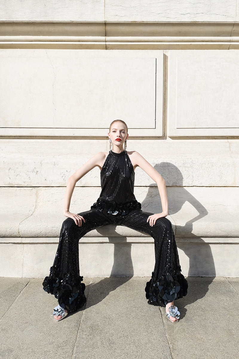 Black Alersundi Brenda two-piece co-ords suit, featuring a fitted top and matching pants, stylish and versatile for various occasions.