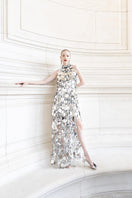 Alersundi Chantal silver gown featuring elegant fabric and flowing silhouette, perfect for formal occasions.