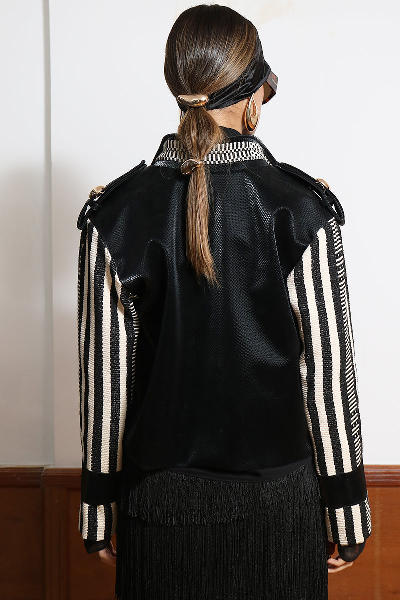 LEDIEL HAMACA jacket displayed on a hanger, showcasing the stylish design and fabric texture of this outdoor jacket.