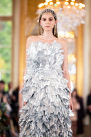 Alersundi VINA silver gown with elegant flowing fabric and intricate detailing, perfect for formal events and evening wear.