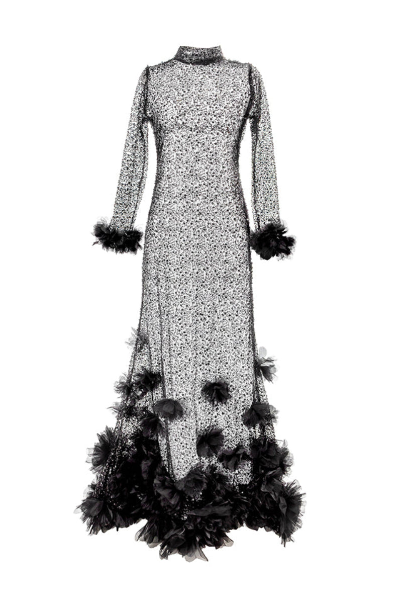 Elegant black Silvia dress by Alersundi, showcasing a flowing gown with detailed fabric and stylish design.