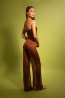 Laura Escobar Tatacoa pants in terracotta color, stylish and comfortable trousers with a relaxed fit and natural fabric texture.