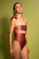 Pink coral one-piece swimsuit by Laura Escobar featuring a flattering fit and stylish design.