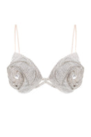 Nué rose crystal bra top with delicate floral details and adjustable straps, designed for stylish, feminine fashion.