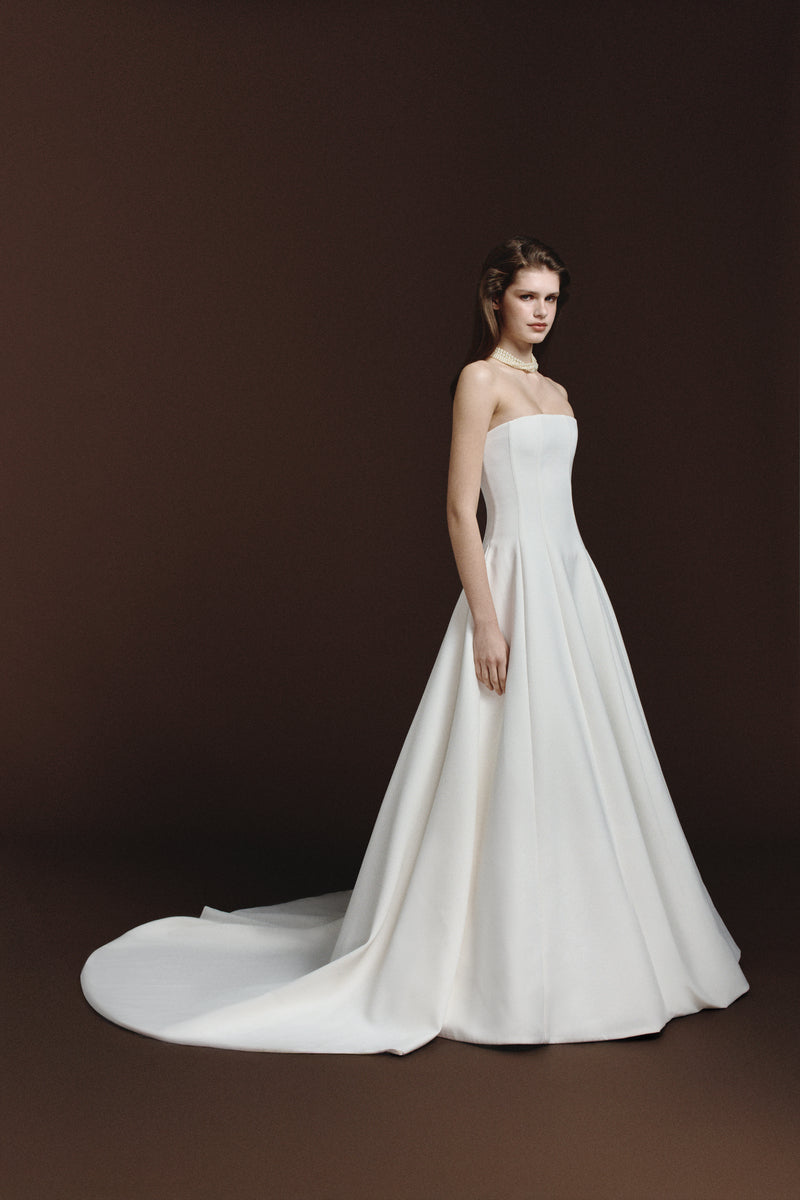 BalYKINA Gabby matte silk gown displayed on a model, featuring elegant design and flowing fabric for formal occasions.