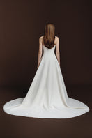 BalYKINA Gabby matte silk gown with elegant drape and fitted waist, shown in a stylish, flowing design.