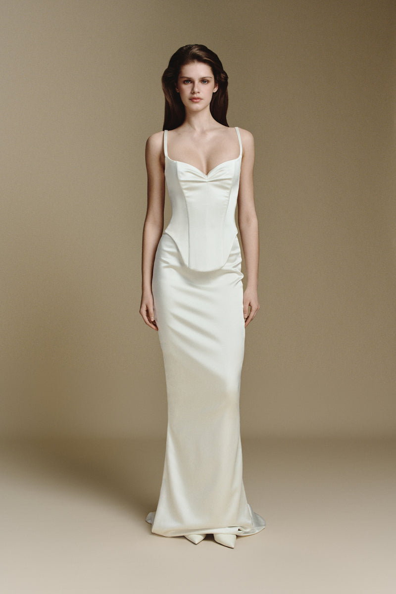 Black satin maxi skirt by Balykina, featuring a flowing soft satin fabric and elegant design perfect for stylish outfits.