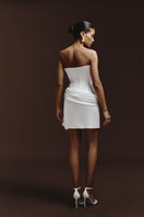 BalYKINA IRMA mini dress with floral print and ruffled sleeves, displayed on a hanger.