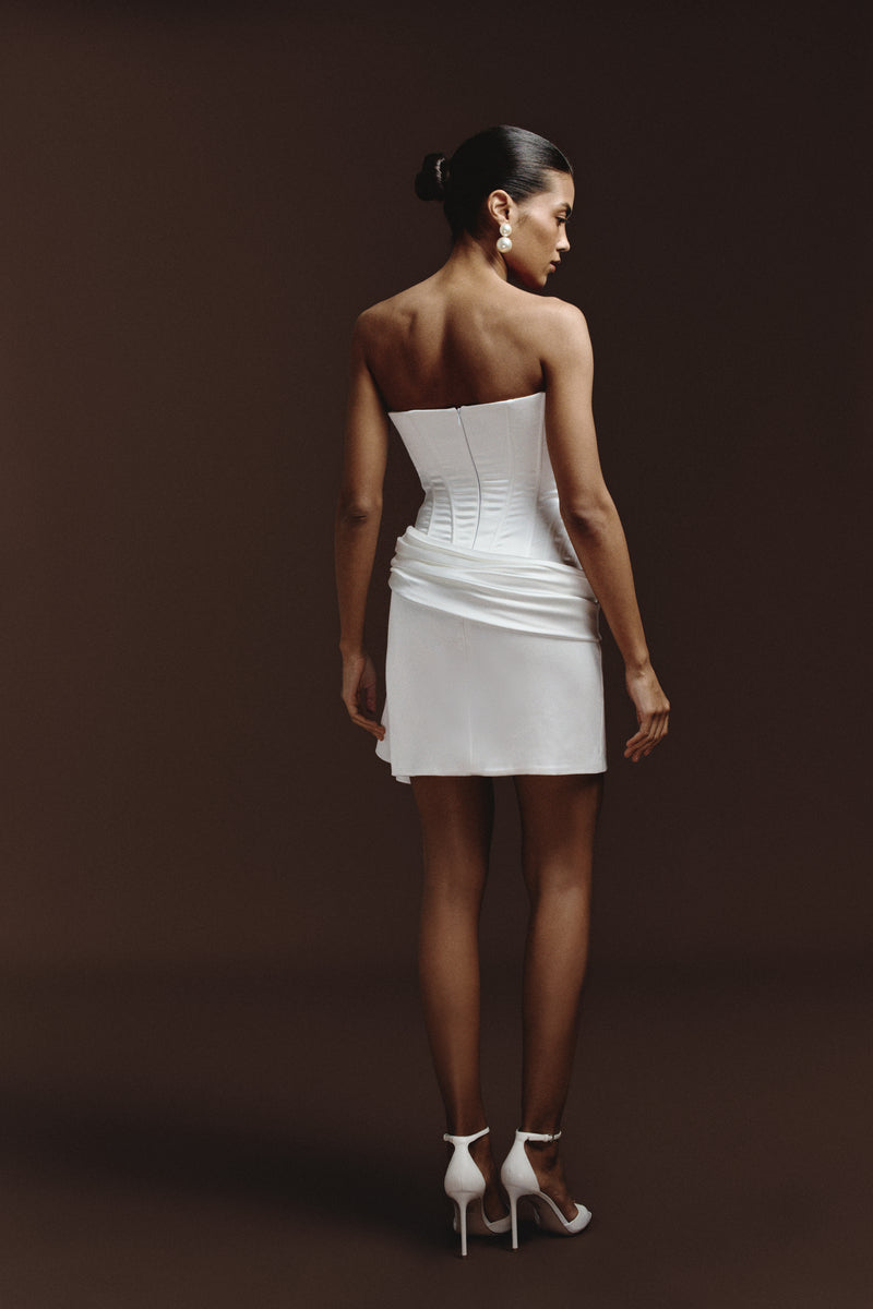 BalYKINA IRMA mini dress with floral print and ruffled sleeves, displayed on a hanger.