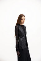 Black leather vest with belt from Vaska, stylish men's jacket featuring a sleek design and front buckle detail.